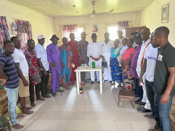 Tombra Mohammed and supporters meeting with community leaders indoors